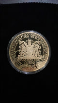 Gold plated copper coin featuring the national anthem