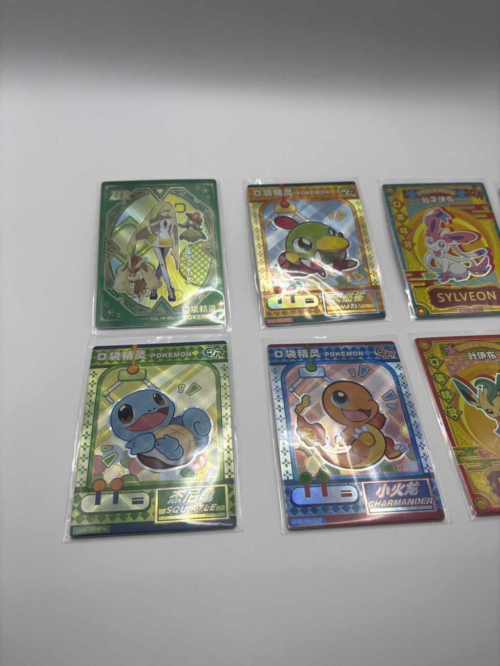 Set of 8 Pokémon Themed Collectible Cards with Protective Sleeves