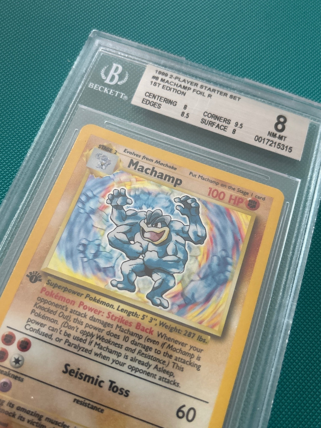 1999 Machamp Foil 1st Edition Pokémon Card BGS 8 NM-MT
