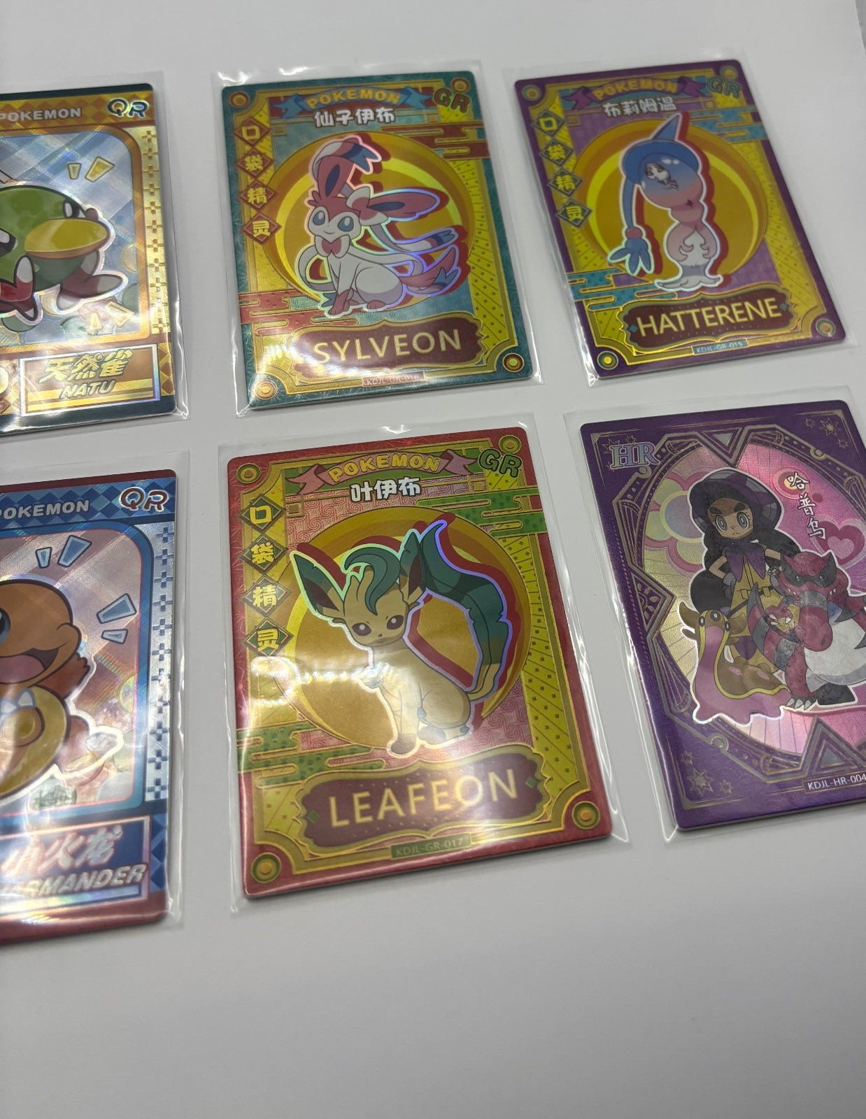 Set of 8 Pokémon Themed Collectible Cards with Protective Sleeves