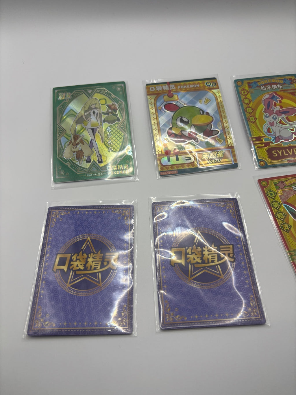 Set of 8 Pokémon Themed Collectible Cards with Protective Sleeves